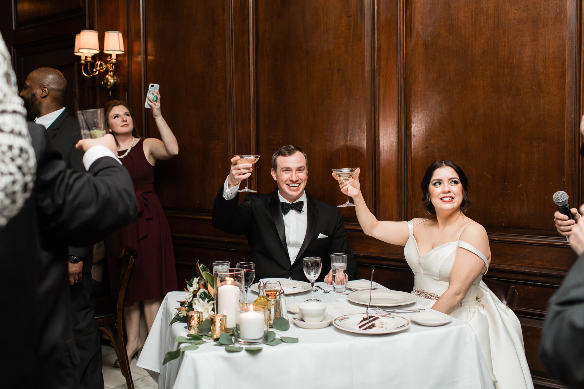 bride and groom cheers | romantic elegant city wedding photography elle rose | oahu hawaii wedding photographer| destination black tie winter wedding in chicago illinois