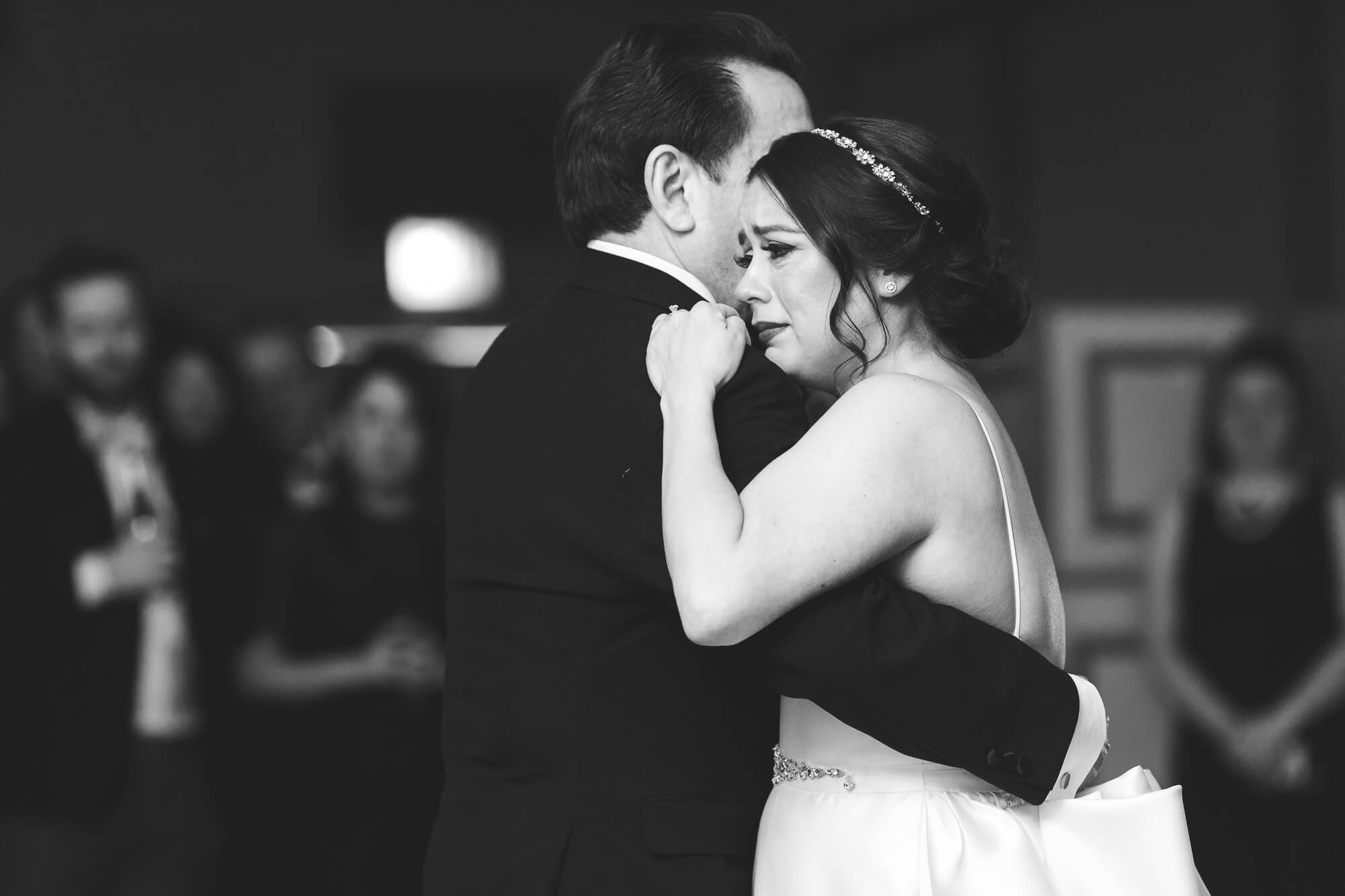 bride crying during first dance | romantic elegant city wedding photography elle rose | oahu hawaii wedding photographer| destination black tie winter wedding in chicago illinois