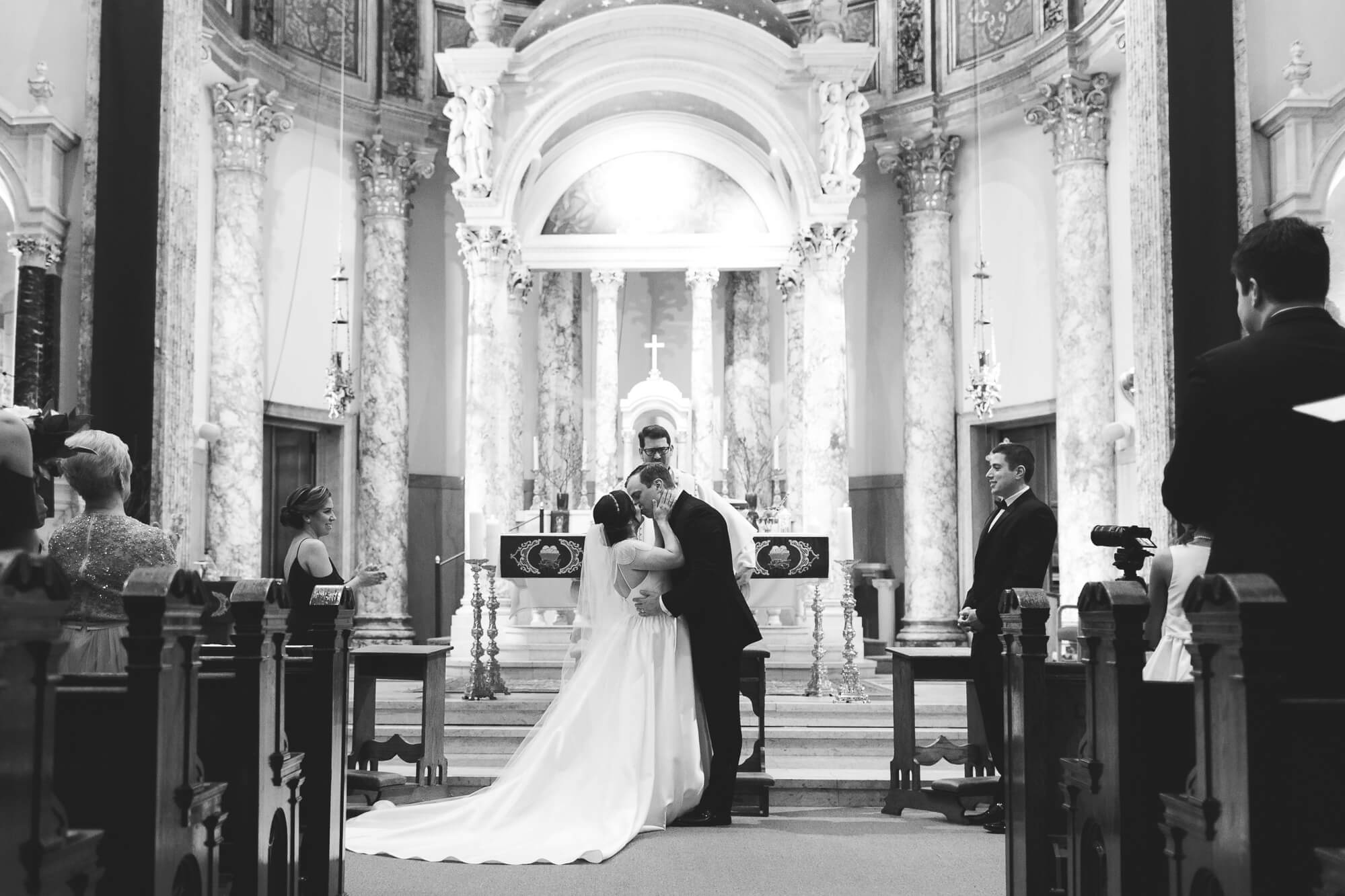 first kiss as wife and husband | hawaii black tie wedding oahu family photography elle rose photo | glamorous destination winter wedding at thompson chicago 