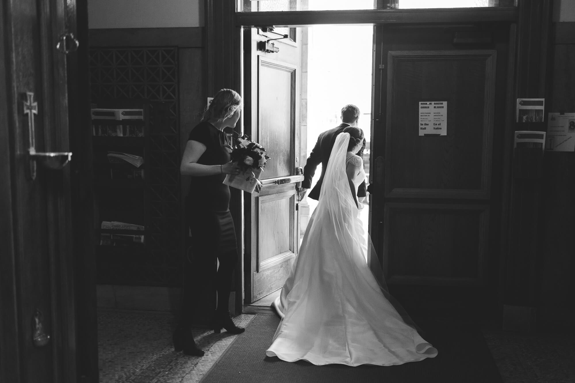 bride leaving the church | hawaii black tie wedding oahu family photography elle rose photo | glamorous destination winter wedding at thompson chicago 