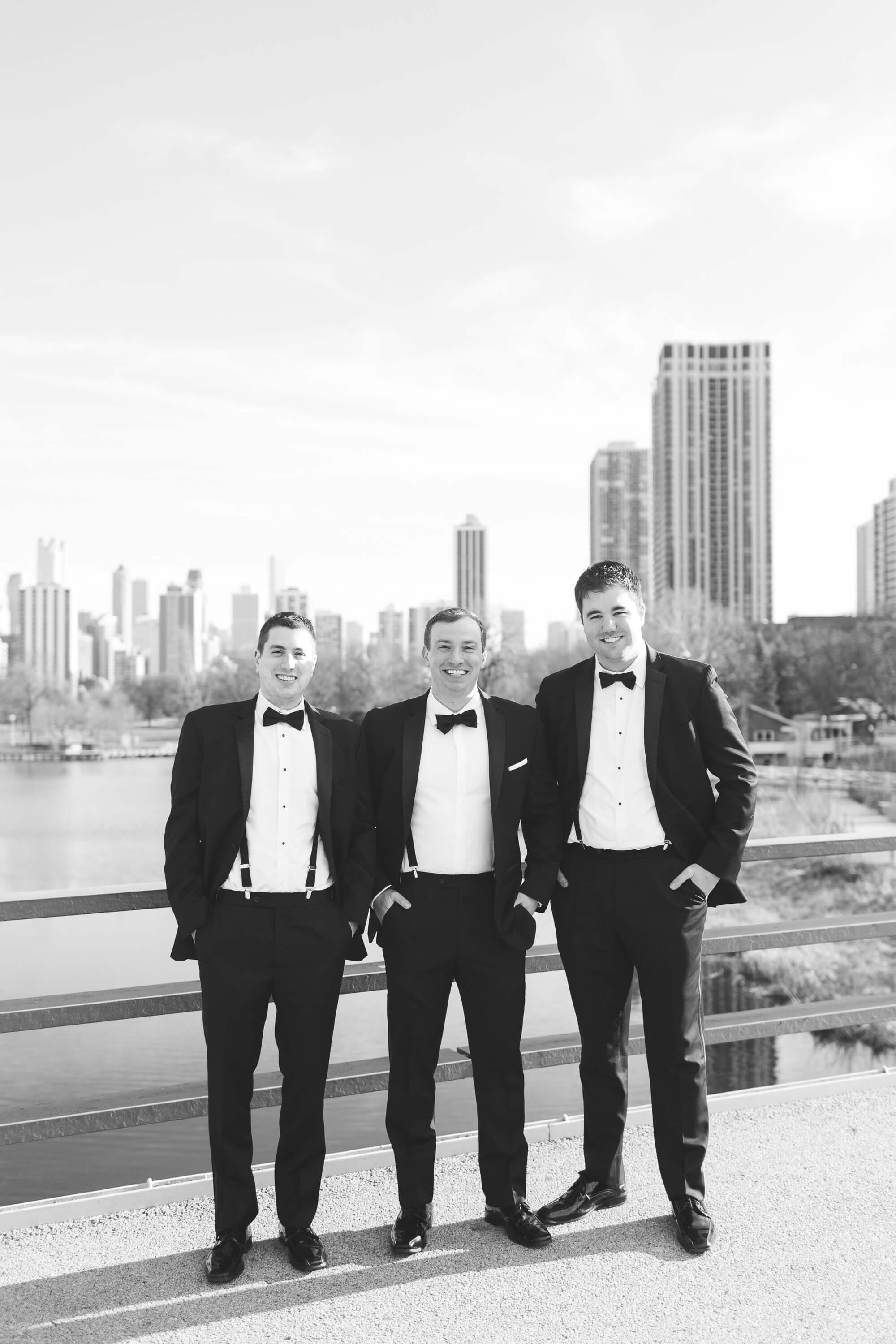 black and white handsome groom and groomsmen | elegant glamorous black tie daytime wedding photography | oahu hawaii wedding photographer elle rose photo | destination winter wedding in chicago illinois