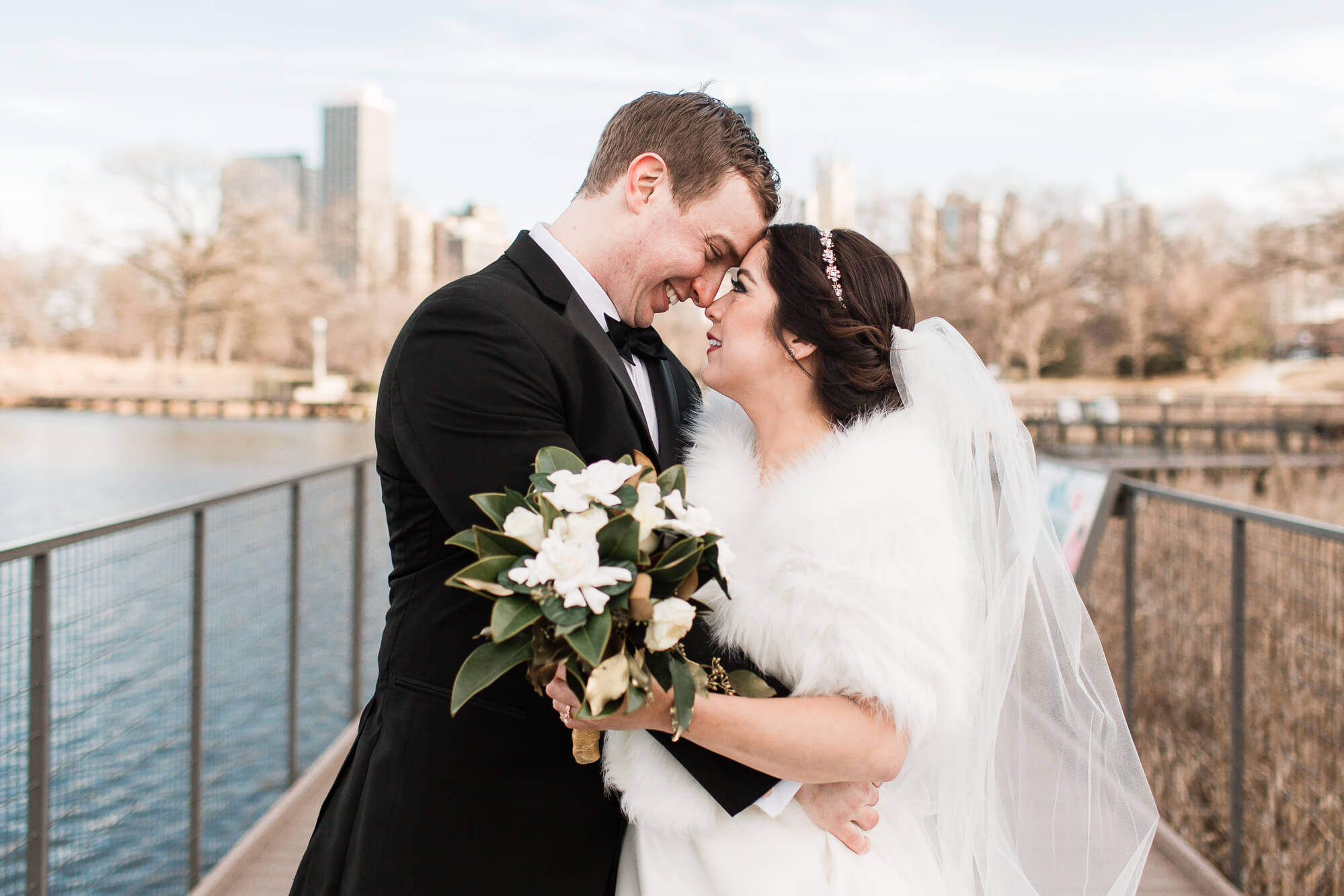 happy groom looking at his new bride | elegant glamorous black tie daytime wedding photography | oahu hawaii wedding photographer elle rose photo | destination winter wedding in chicago illinois