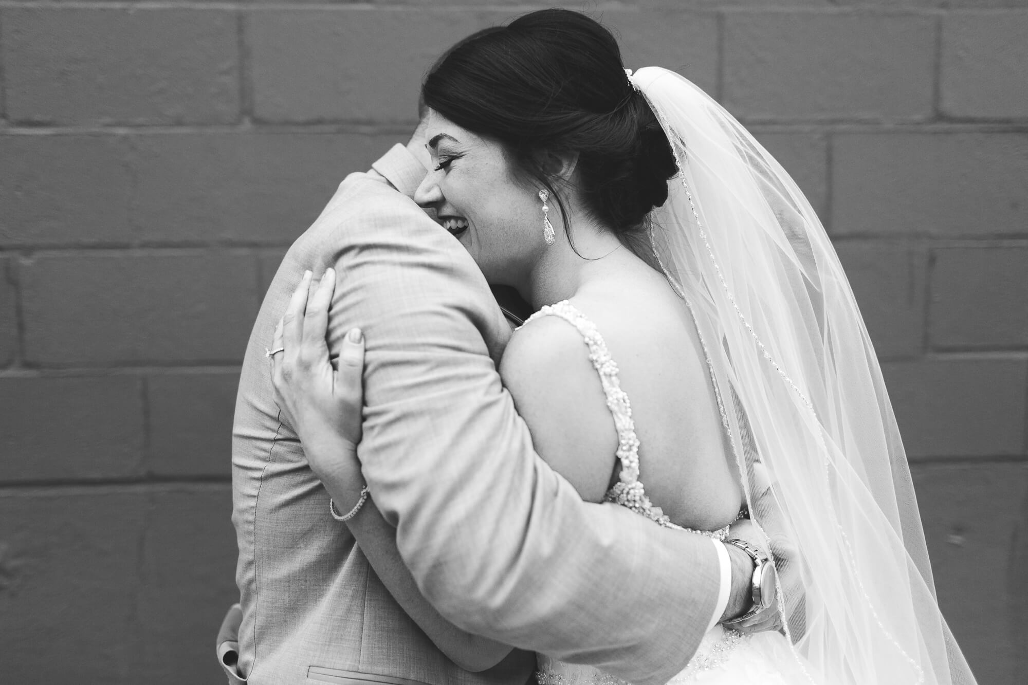 bride and groom hugging each other- best hawaii wedding photos