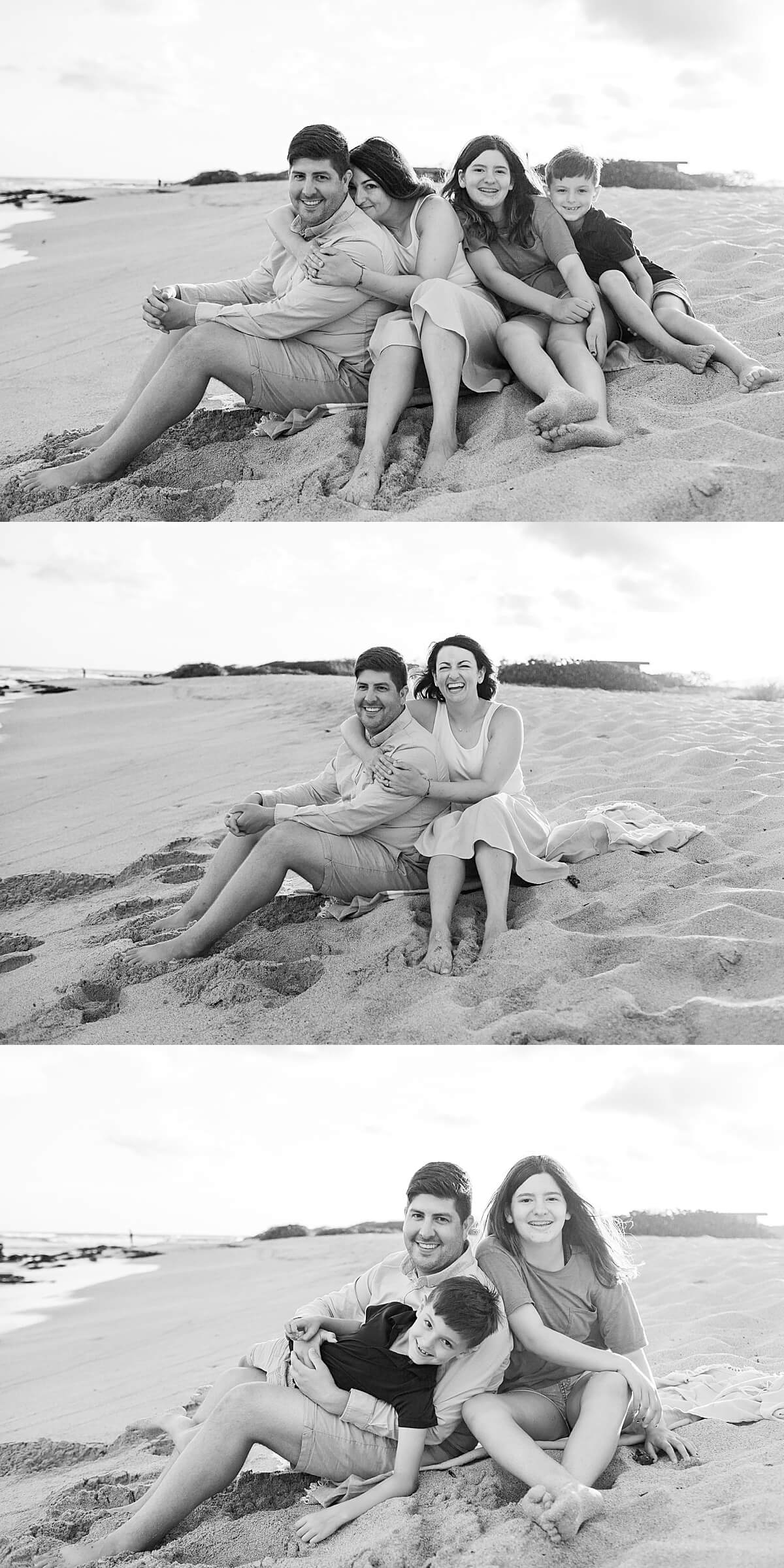 black and white family photography in Honolulu with family of four sitting in the sand