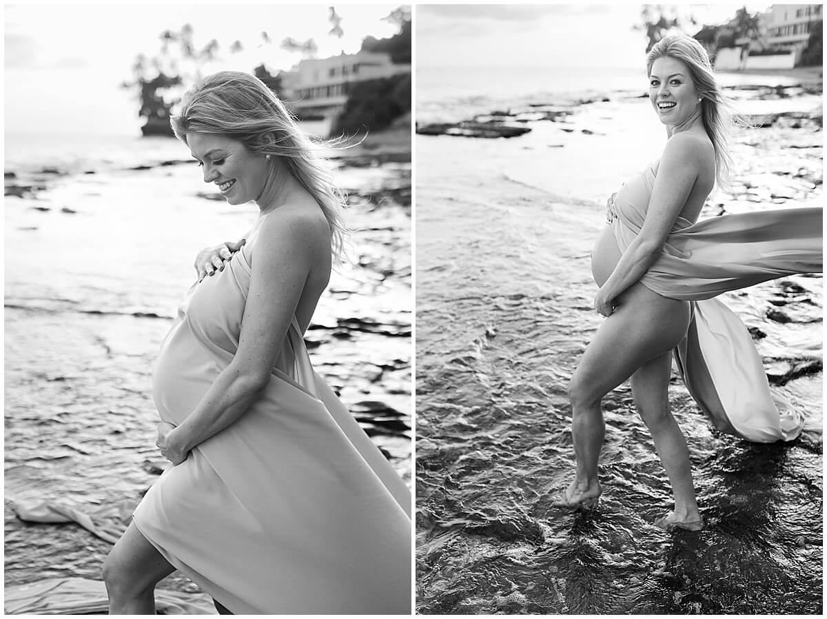 Black and white maternity photos for Beach maternity session wearing gown with long train thrown in the wind