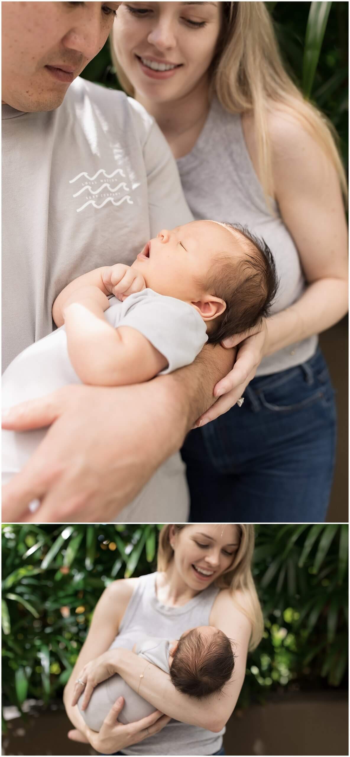 Dad holding newborn in arms during midday session with Oahu newborn photographer