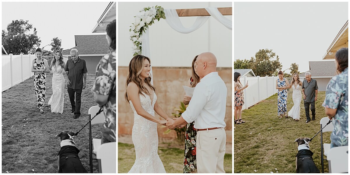 bride walks down the aisle with mother and father by Elle rose photo